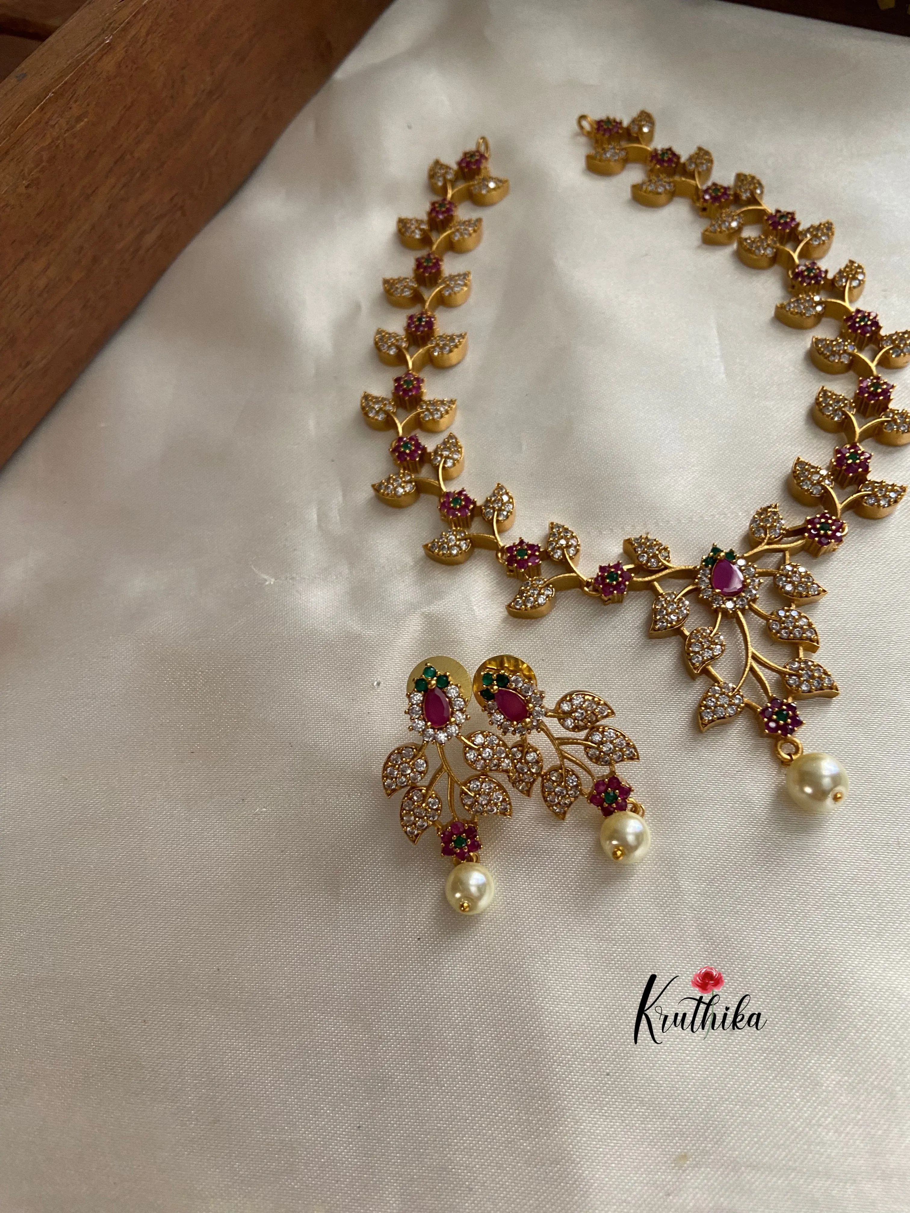 Gold finish CZ leaves necklace NC758