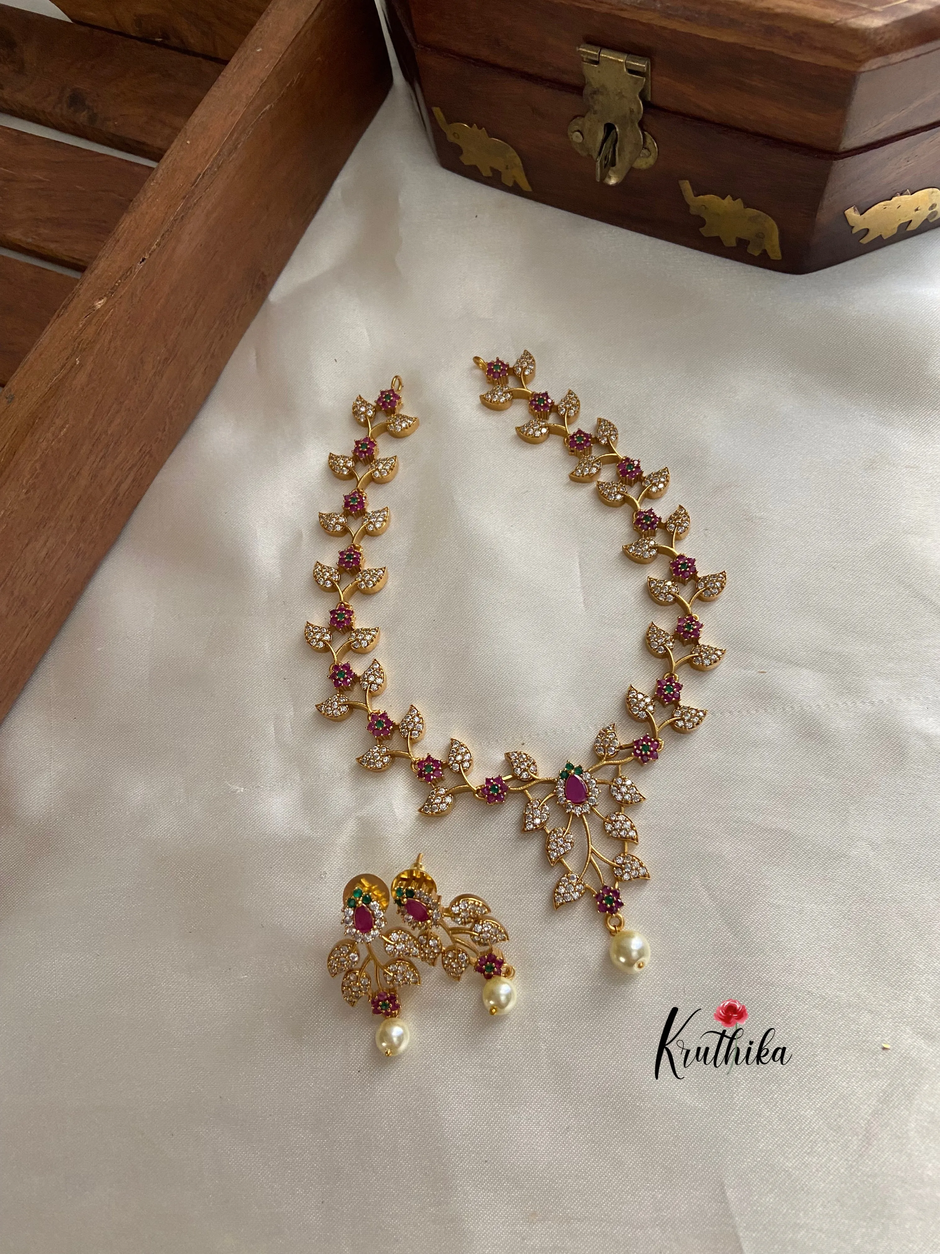 Gold finish CZ leaves necklace NC758