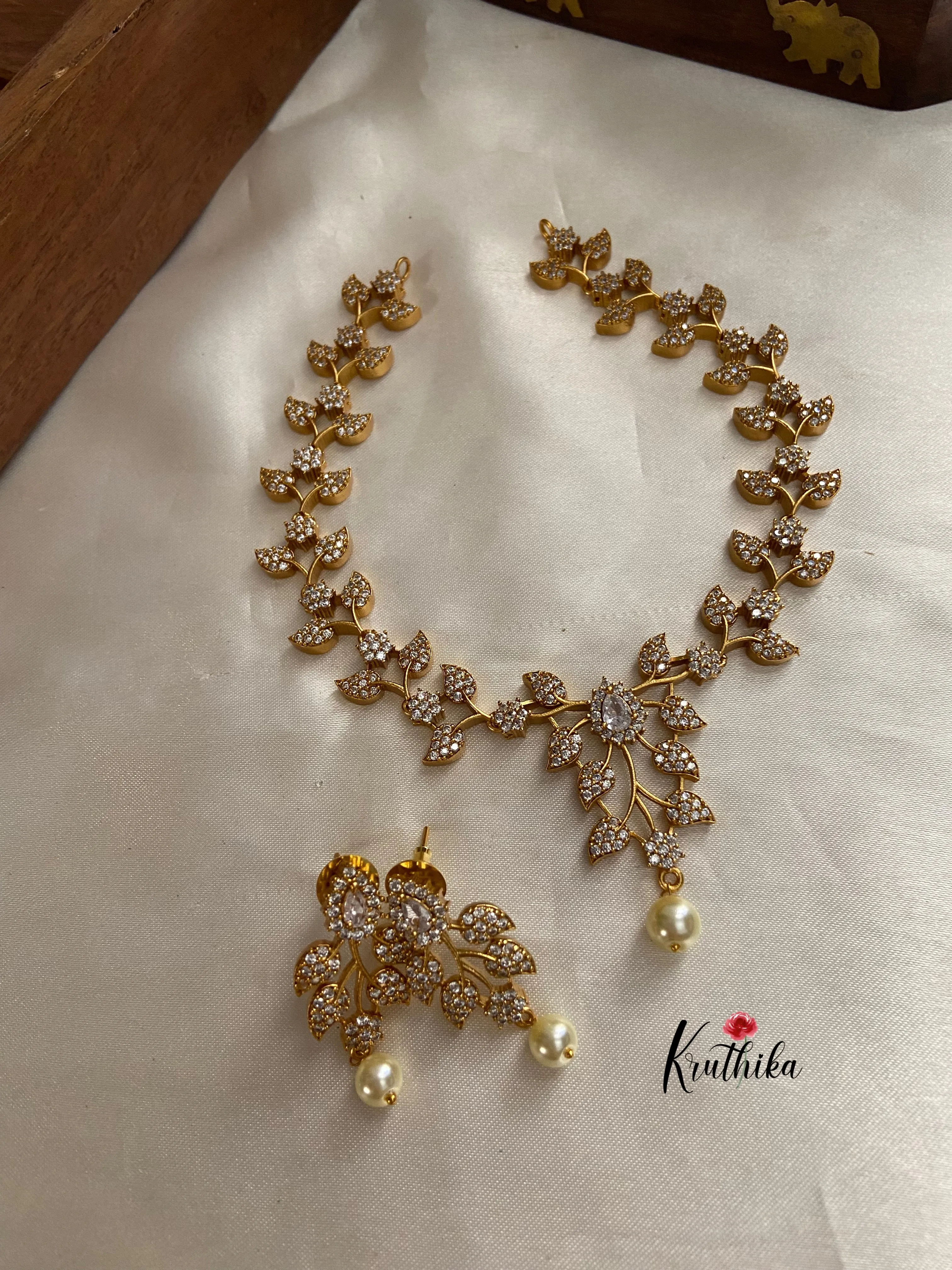 Gold finish CZ leaves necklace NC758