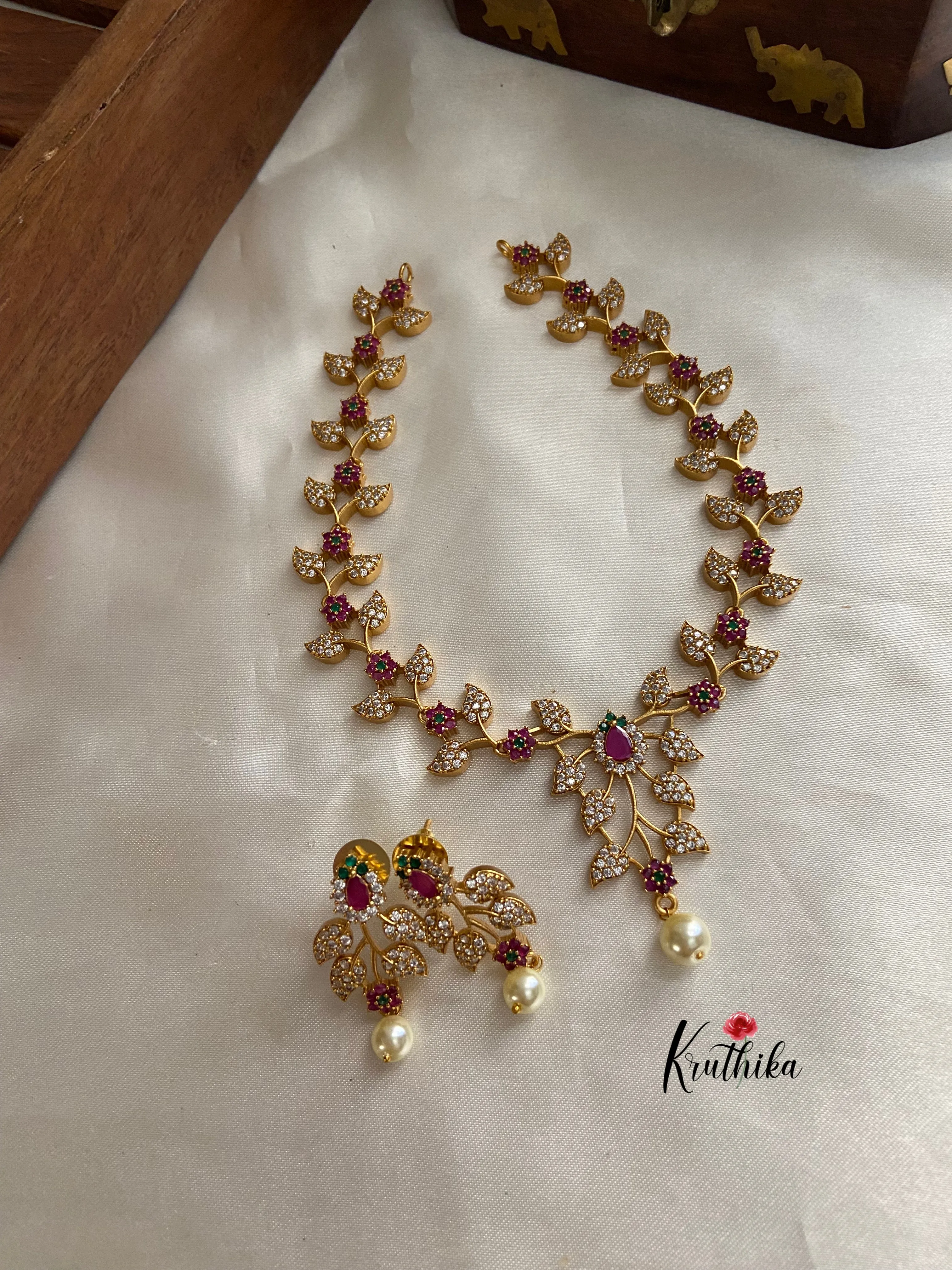 Gold finish CZ leaves necklace NC758